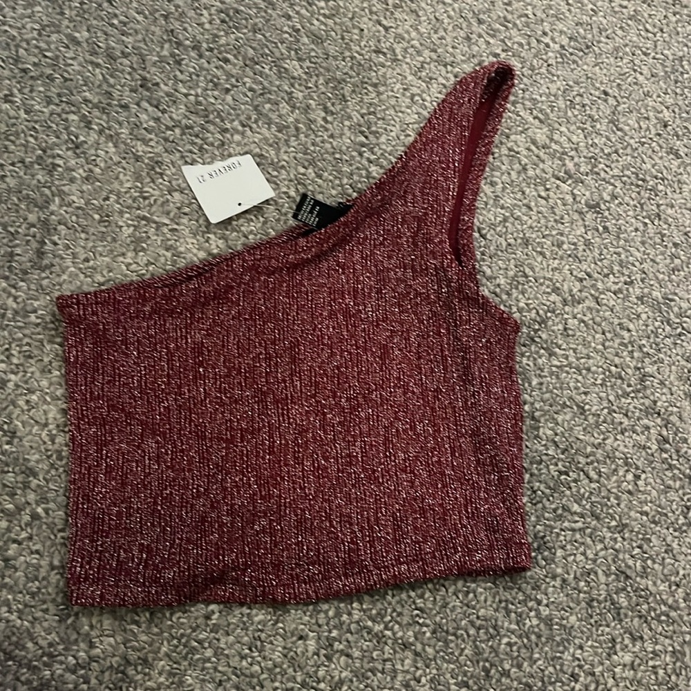 Shimmery forever 21 one shoulder tank top. Never worn.